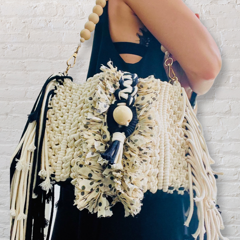 Bound macrame clutch and shoulder bag in black and white 